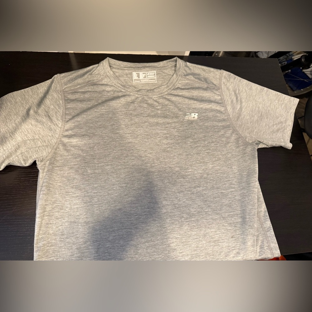 Like new. New Balance body dry technology tee. Athletic performance tee. Men’s M
